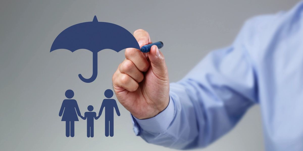 Hand drawing an umbrella over a family
